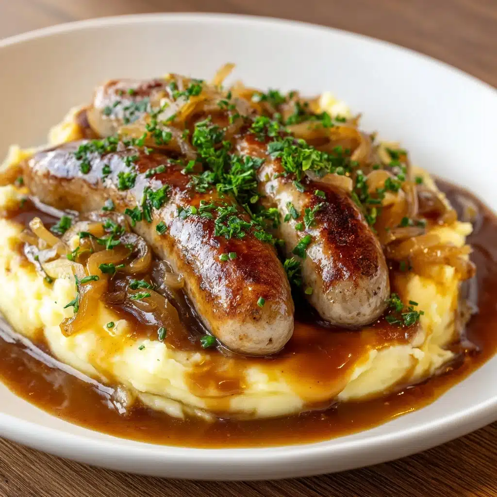 Bangers and Colcannon with Guinness Onion Gravy Recipe - Recipe Image